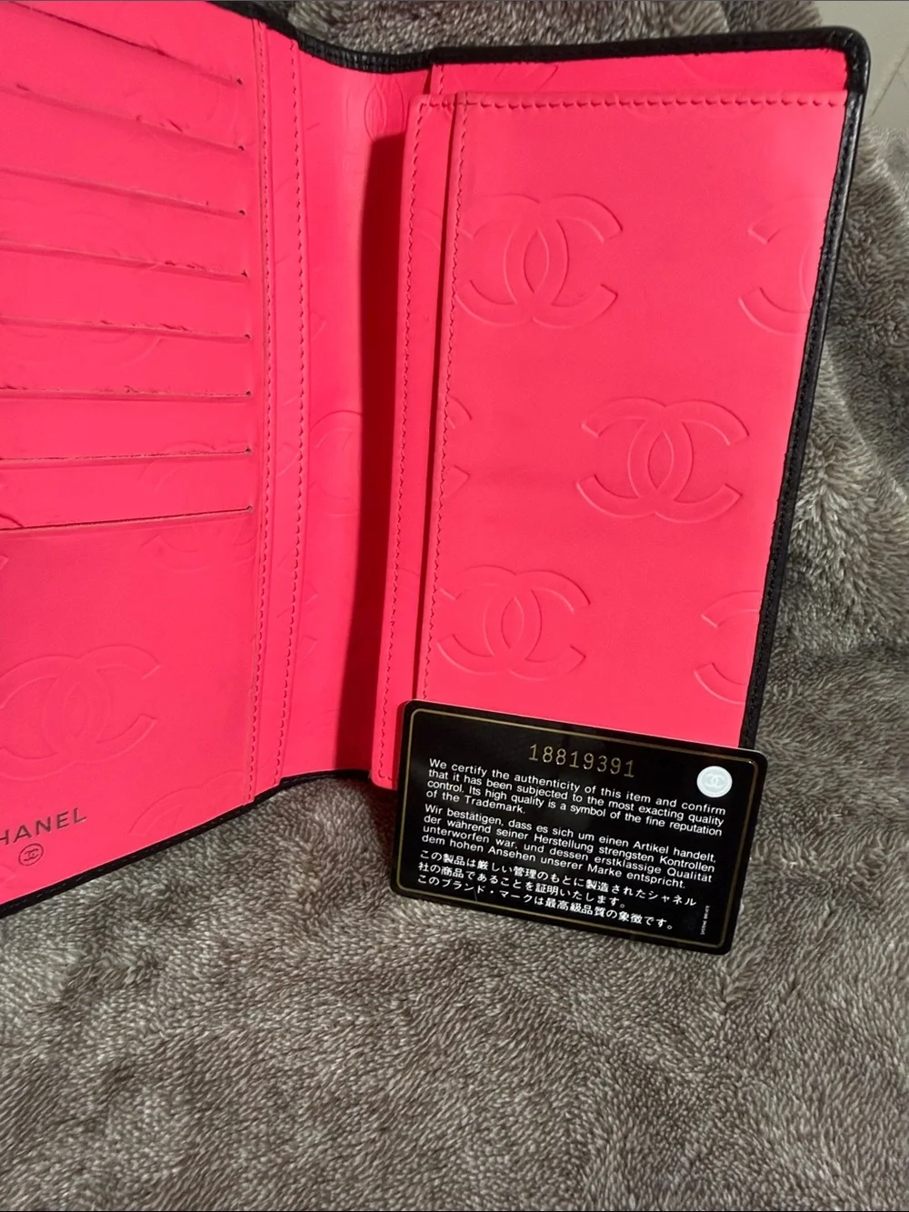 CHANEL Black Quilted Lambskin Wallet with Glossy CC Accent